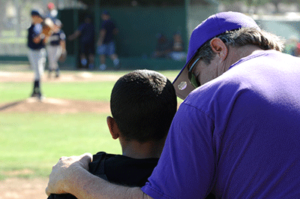 Coach Consoling Athlete