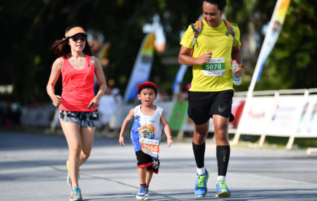 family running a race together