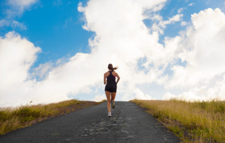 woman running track