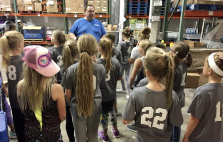 Red River Valley United Soccer Club in a warehouse